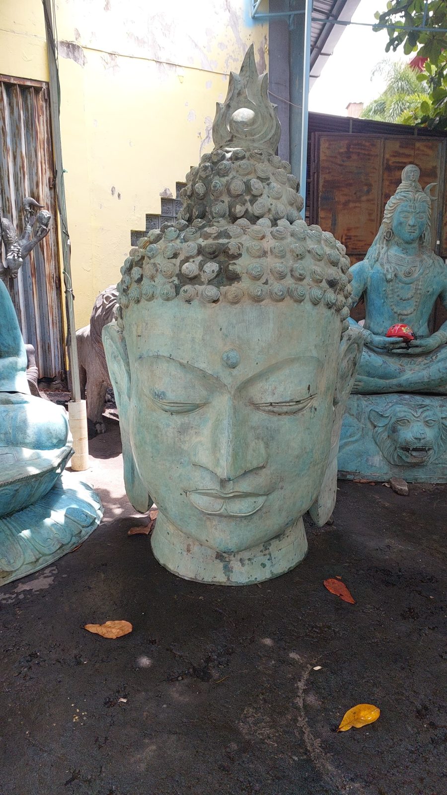Large bronze Buddha head sculpture